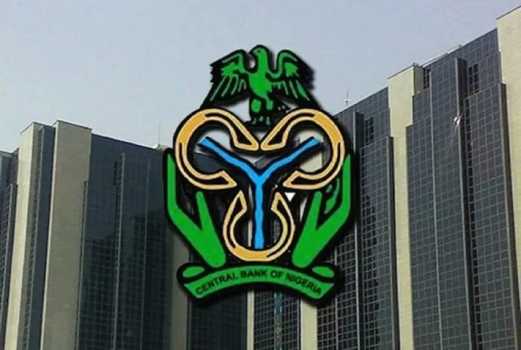 Logo of the Central Bank of Nigeria superimposed on the apex bank's headquarters