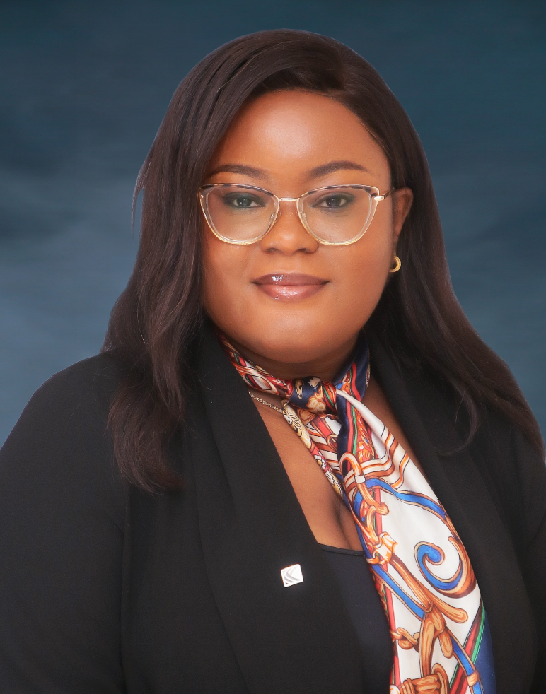 Bespectacled Nigerian women with long hairs, a scarf and a black jacket